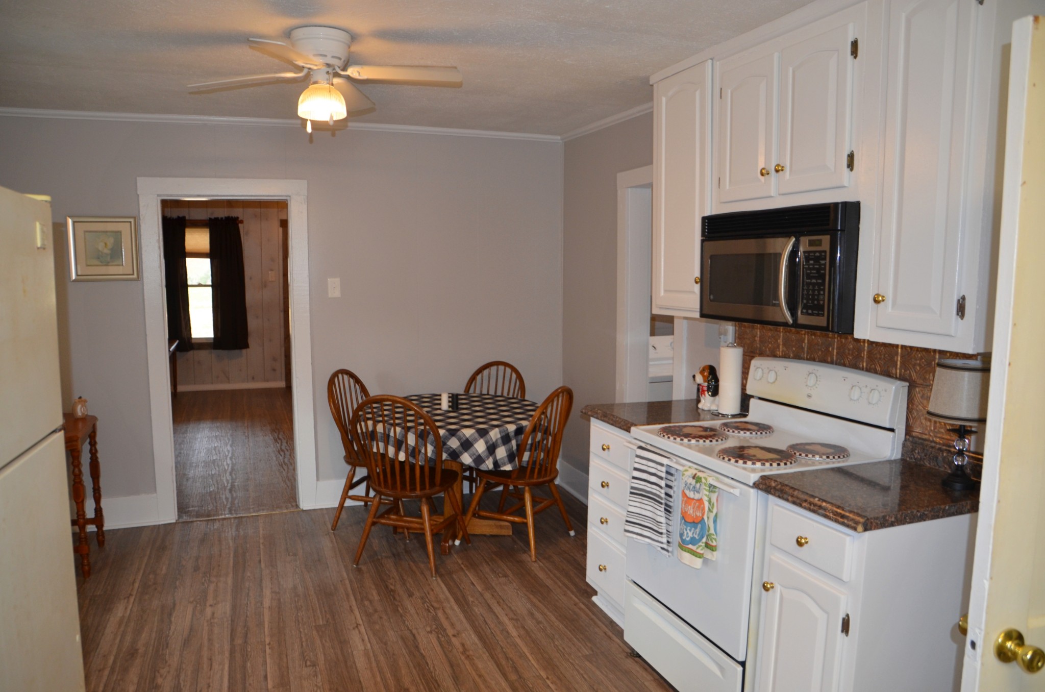 240 Red Hill Road Taft, TN 38488 - Photo 8 of 20 a kitchen that has a cabinets counter space and a sink