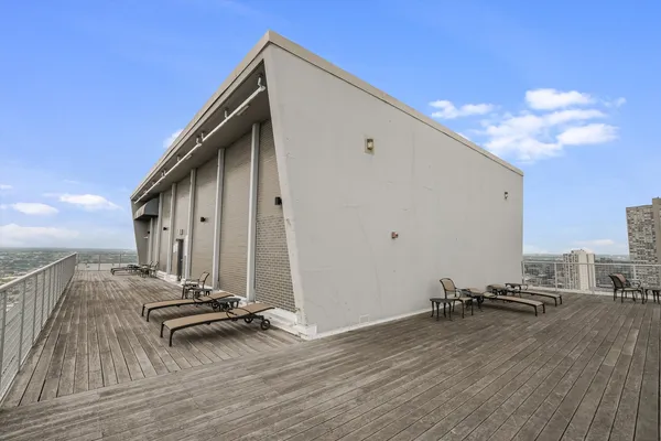 a view of a terrace with chairs