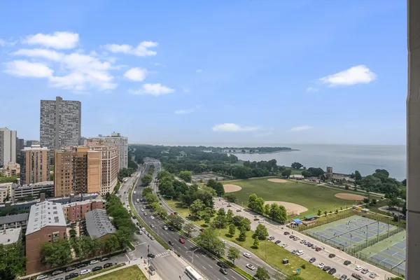 a view of a city with tall buildings