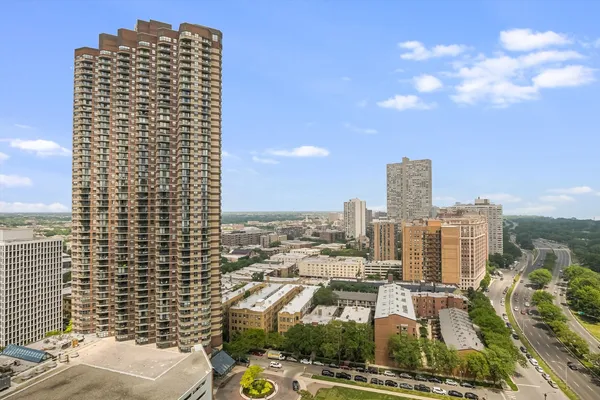 a view of a city with tall buildings