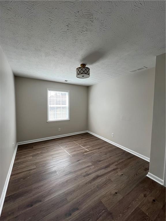 5990 Wellborn Trace Lithonia, GA 30058 - Photo 19 of 56 a view of an empty room and a window