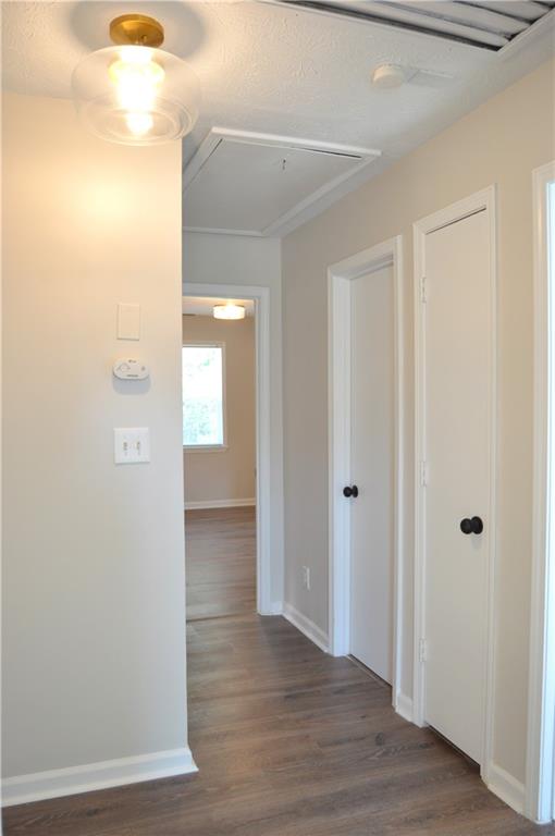 5990 Wellborn Trace Lithonia, GA 30058 - Photo 21 of 56 a view of a hallway with wooden floor