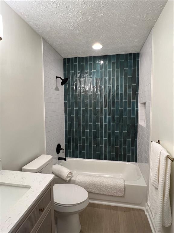 5990 Wellborn Trace Lithonia, GA 30058 - Photo 22 of 56 a bathroom with a sink toilet and shower
