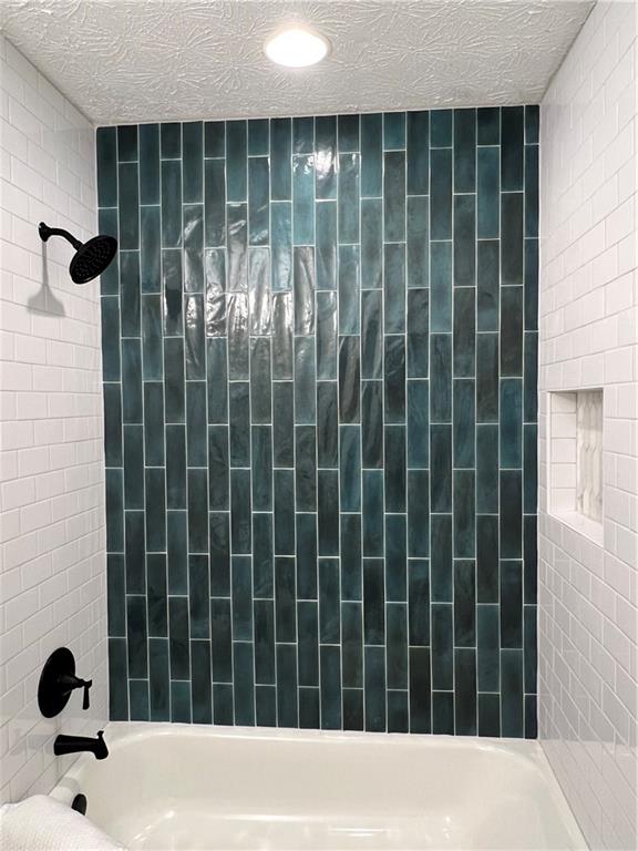 5990 Wellborn Trace Lithonia, GA 30058 - Photo 23 of 56 a bathroom with a shower