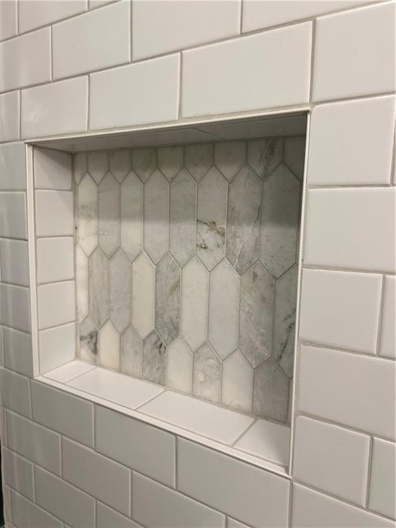 5990 Wellborn Trace Lithonia, GA 30058 - Photo 24 of 56 a bathroom with a shower