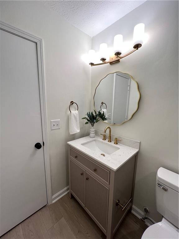 5990 Wellborn Trace Lithonia, GA 30058 - Photo 27 of 56 a bathroom with a sink and a mirror