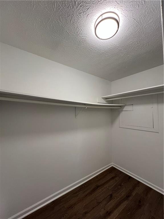 5990 Wellborn Trace Lithonia, GA 30058 - Photo 31 of 56 a view of a room with wooden floor