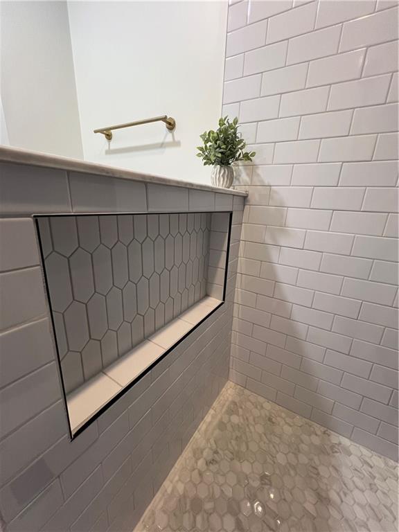 5990 Wellborn Trace Lithonia, GA 30058 - Photo 38 of 56 a bathroom with a shower