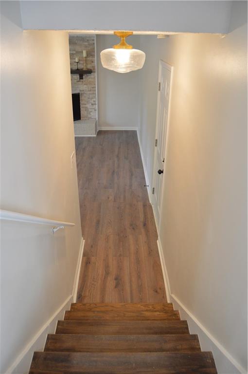 5990 Wellborn Trace Lithonia, GA 30058 - Photo 39 of 56 a view of entryway with wooden floor