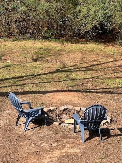 5990 Wellborn Trace Lithonia, GA 30058 - Photo 47 of 56 a roof deck with a couple of chairs