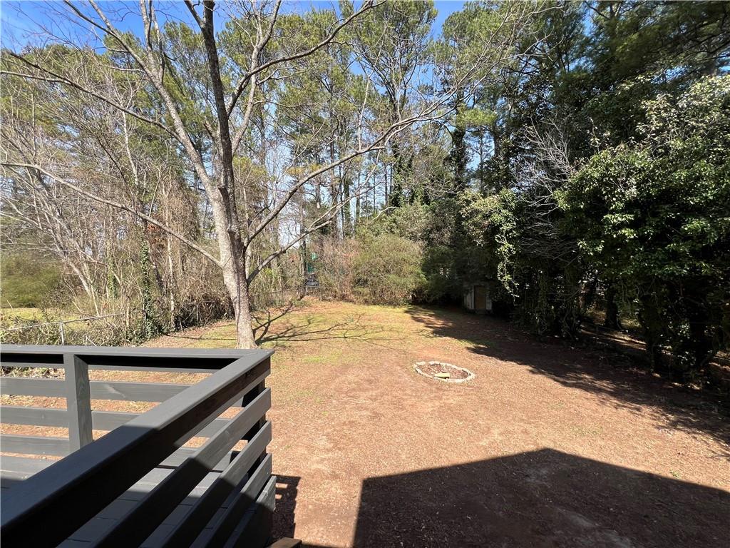 5990 Wellborn Trace Lithonia, GA 30058 - Photo 52 of 56 a view of a backyard of the house