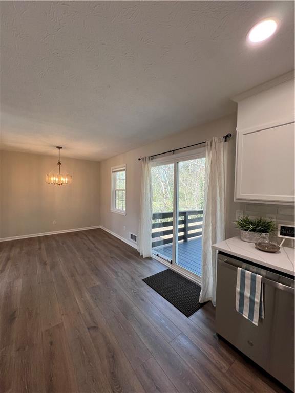 5990 Wellborn Trace Lithonia, GA 30058 - Photo 10 of 56 a view of an empty room and window and wooden floor