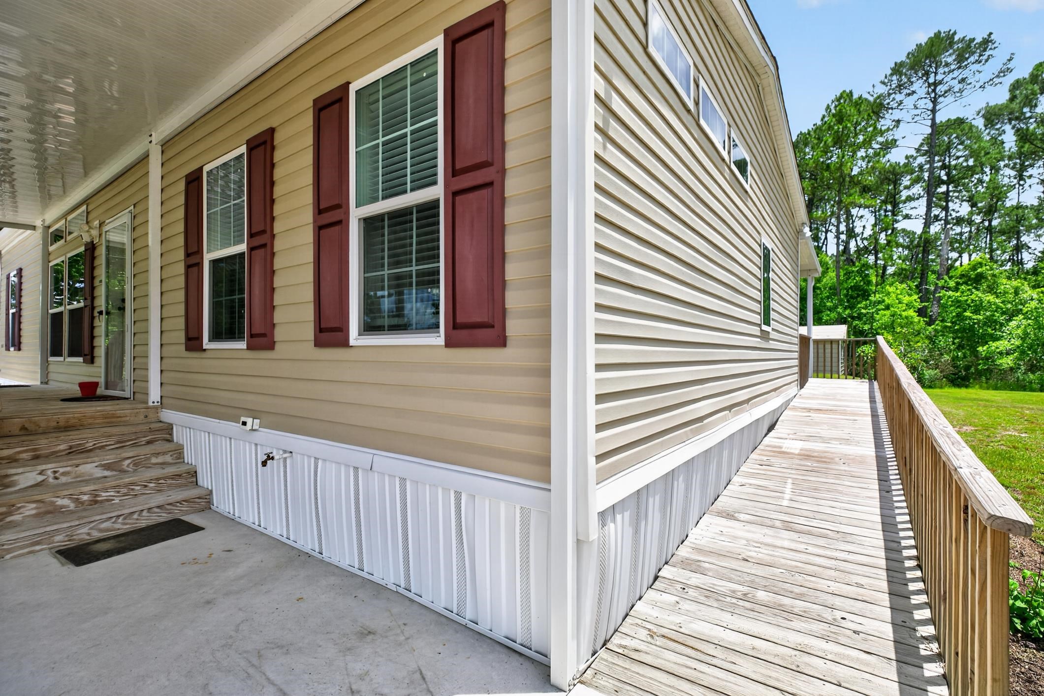 101 Trout Trail Crescent City, FL 32112 - Photo 20 of 45 a view of a brick house with many windows