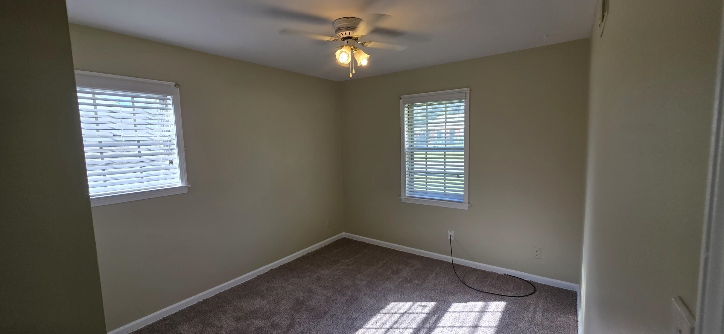 523 Shofner Avenue Memphis, TN 38109 - Photo 9 of 12 Carpeted empty room with baseboards and ceiling fan