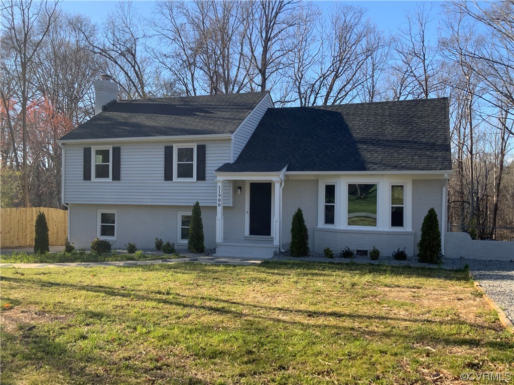 a house with swimming pool in front of it