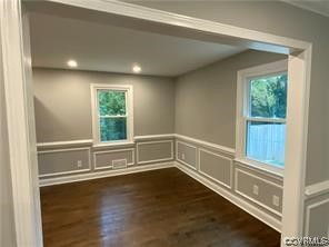 11900 Deerhurst Drive Midlothian, VA 23113 - Photo 14 of 33 a view of an empty room with wooden floor and a window