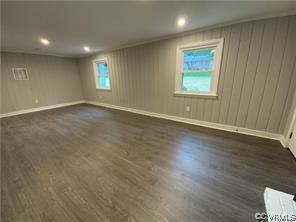 11900 Deerhurst Drive Midlothian, VA 23113 - Photo 21 of 33 an empty room with wooden floor and windows