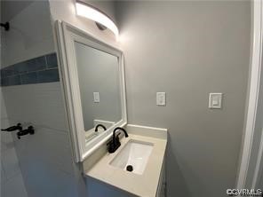 11900 Deerhurst Drive Midlothian, VA 23113 - Photo 24 of 33 a bathroom with a sink a mirror and shower