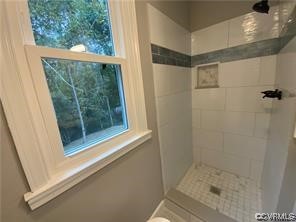 11900 Deerhurst Drive Midlothian, VA 23113 - Photo 25 of 33 a bathroom with a glass shower door