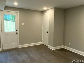 11900 Deerhurst Drive Midlothian, VA 23113 - Photo 26 of 33 an empty room with wooden floor and windows