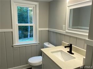 11900 Deerhurst Drive Midlothian, VA 23113 - Photo 28 of 33 a bathroom with a sink a toilet and window