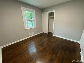 11900 Deerhurst Drive Midlothian, VA 23113 - Photo 29 of 33 an empty room with wooden floor and windows