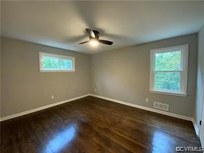 11900 Deerhurst Drive Midlothian, VA 23113 - Photo 30 of 33 a view of an empty room with wooden floor and a window