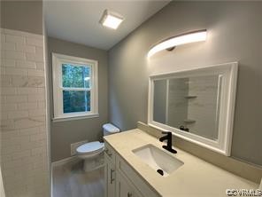 11900 Deerhurst Drive Midlothian, VA 23113 - Photo 32 of 33 a bathroom with a sink toilet and shower