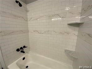 11900 Deerhurst Drive Midlothian, VA 23113 - Photo 33 of 33 a bathroom with a bathtub