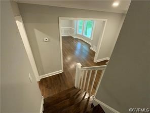 11900 Deerhurst Drive Midlothian, VA 23113 - Photo 10 of 33 a view of a hallway with wooden floor and staircase
