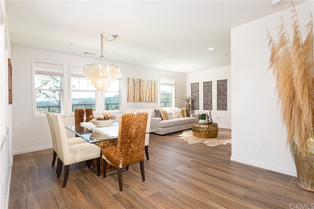 183 Patria Rancho Mission Viejo, CA 92694 - Photo 1 of 1 a living room with furniture and a wooden floor