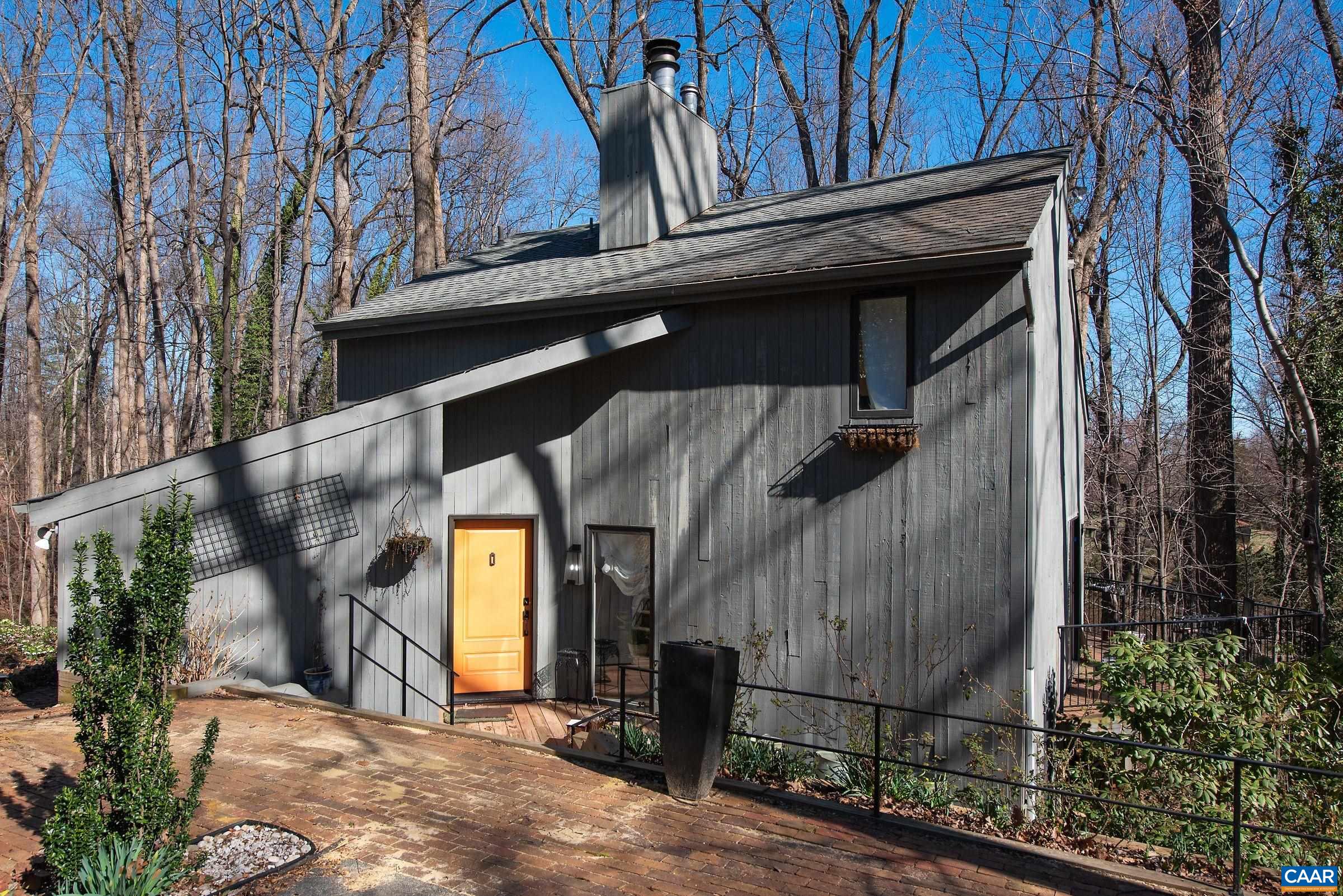 659 Broomley Road Charlottesville, VA 22901 - Photo 1 of 32 a view of a house with a tree