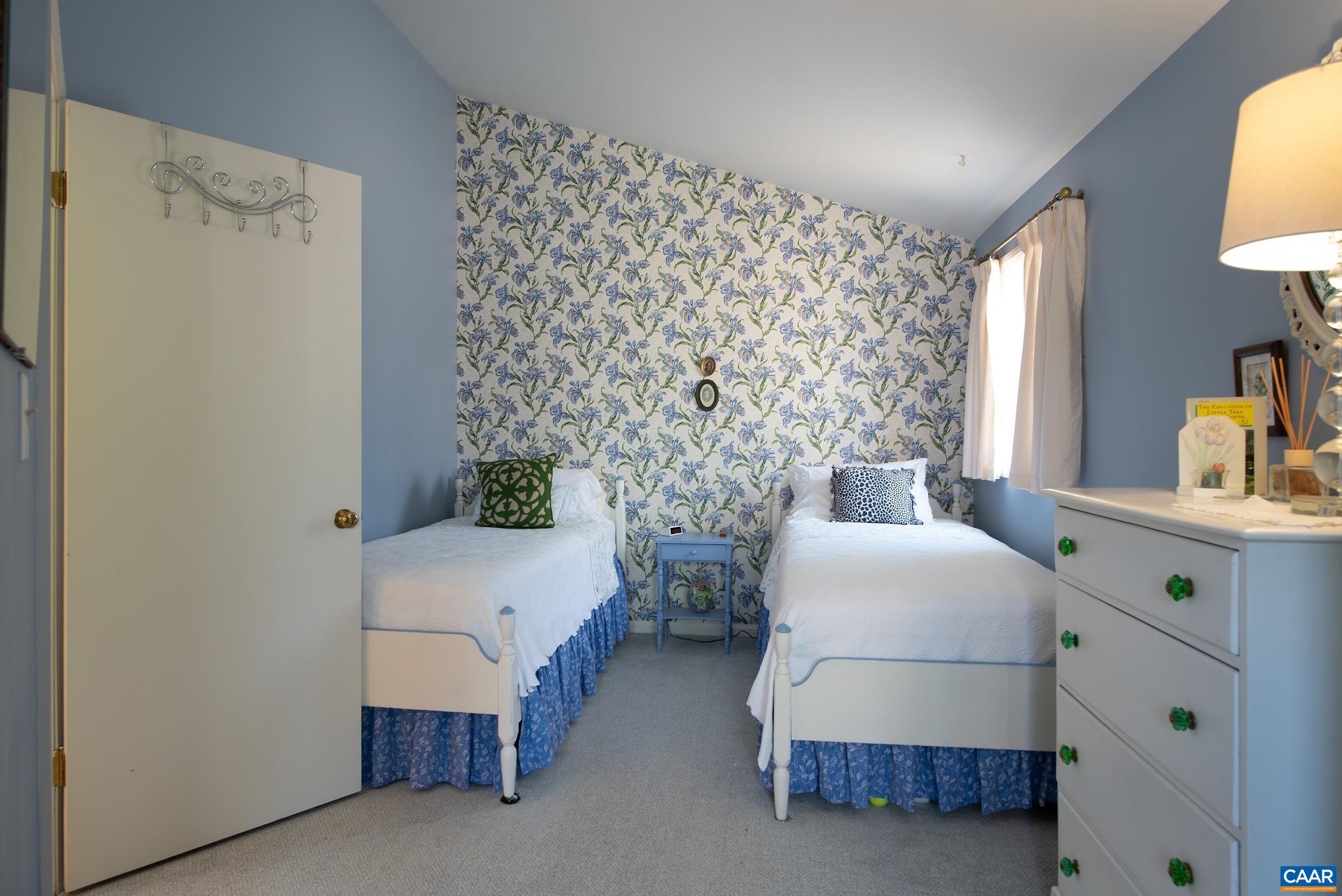 659 Broomley Road Charlottesville, VA 22901 - Photo 11 of 32 a bedroom with bed and a window