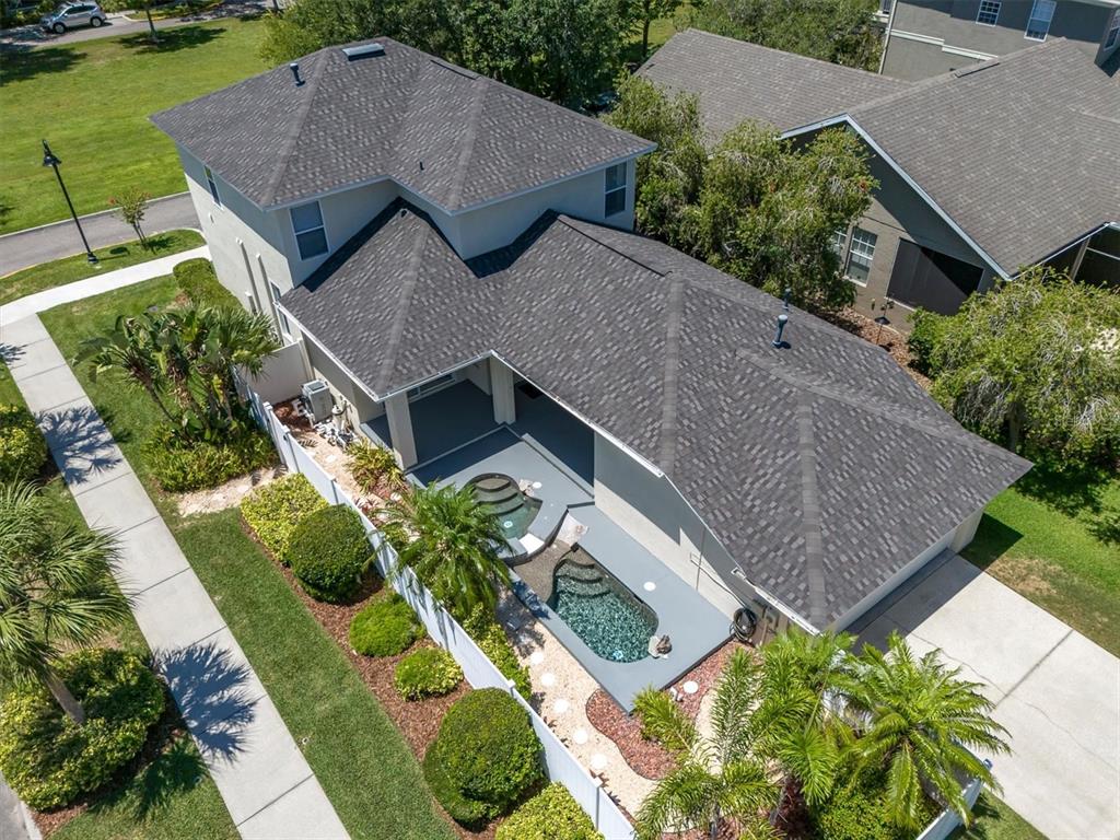 10121 Porch Street New Port Richey, FL 34655 - Photo 44 of 57 an aerial view of a house with a yard and potted plants