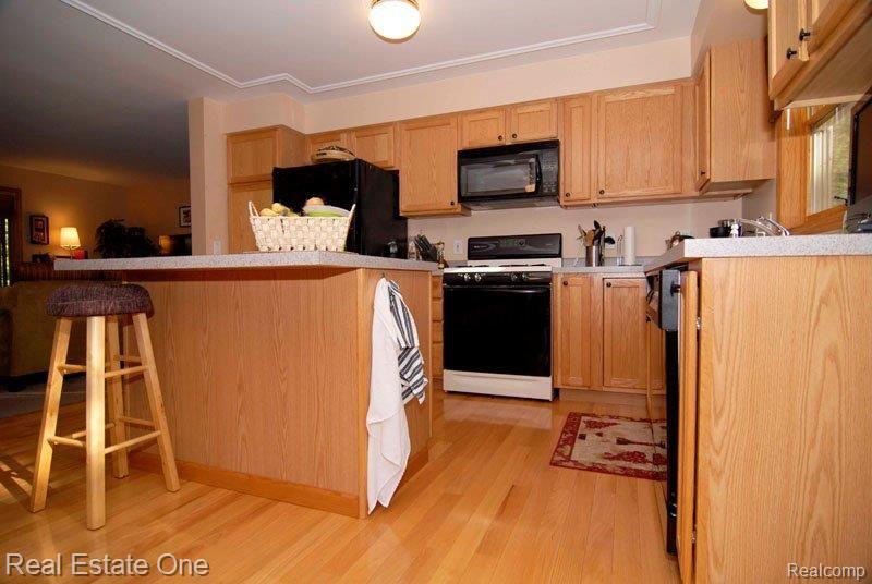 4361 Ash Road Lincoln, MI 48742 - Photo 18 of 25 Hardwood Floors