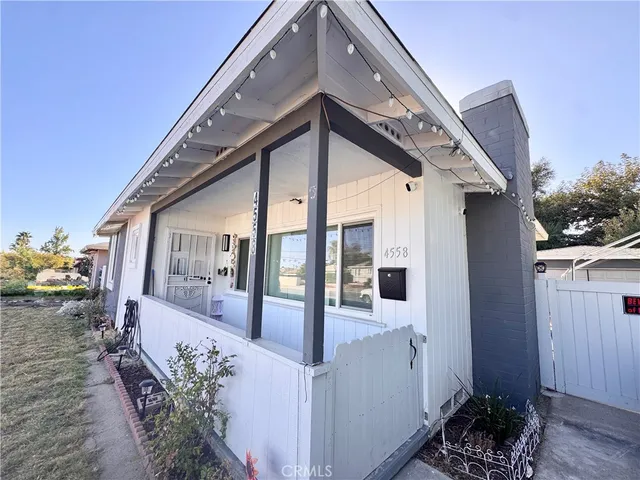 a view of a house with a porch