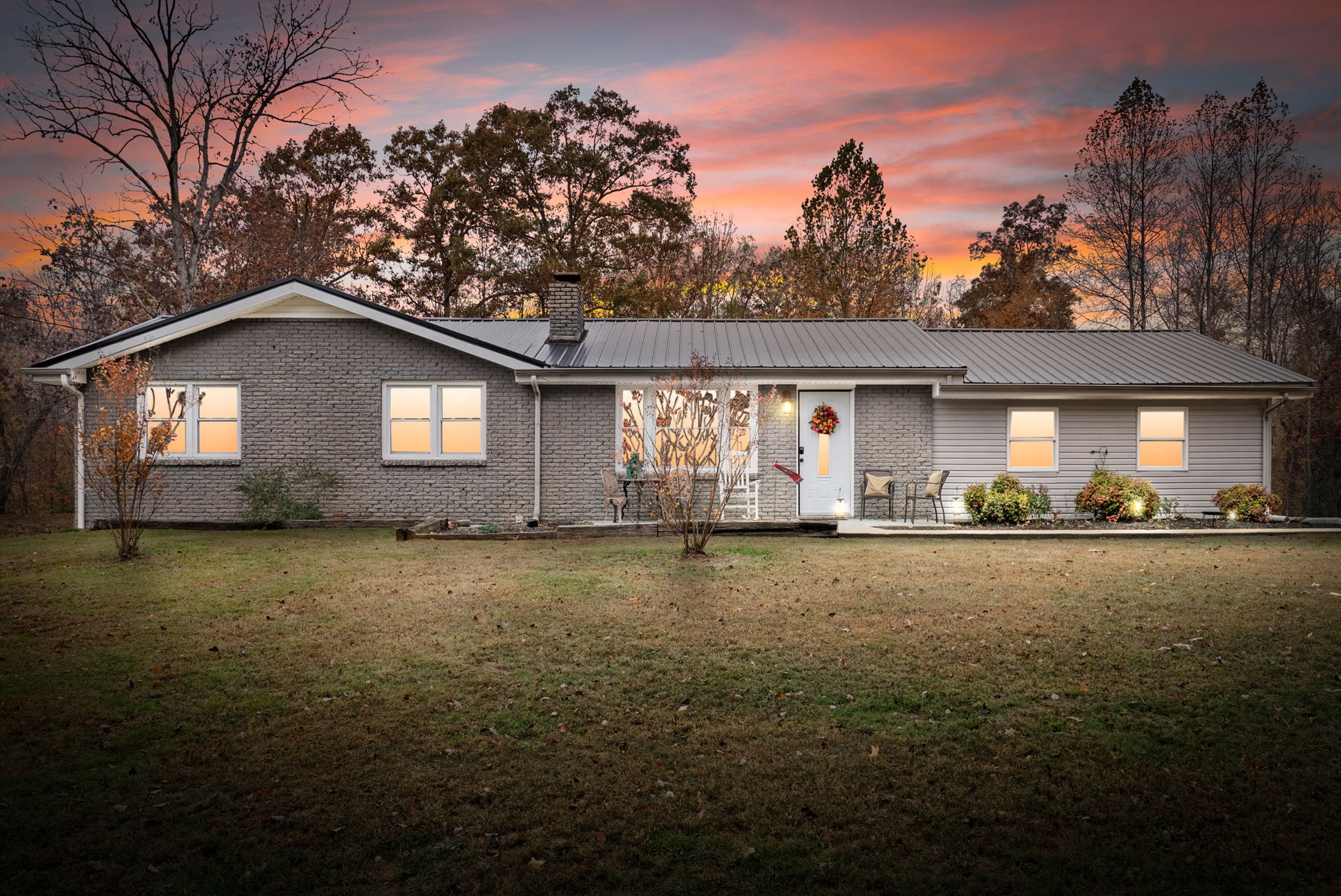 a front view of a house with yard