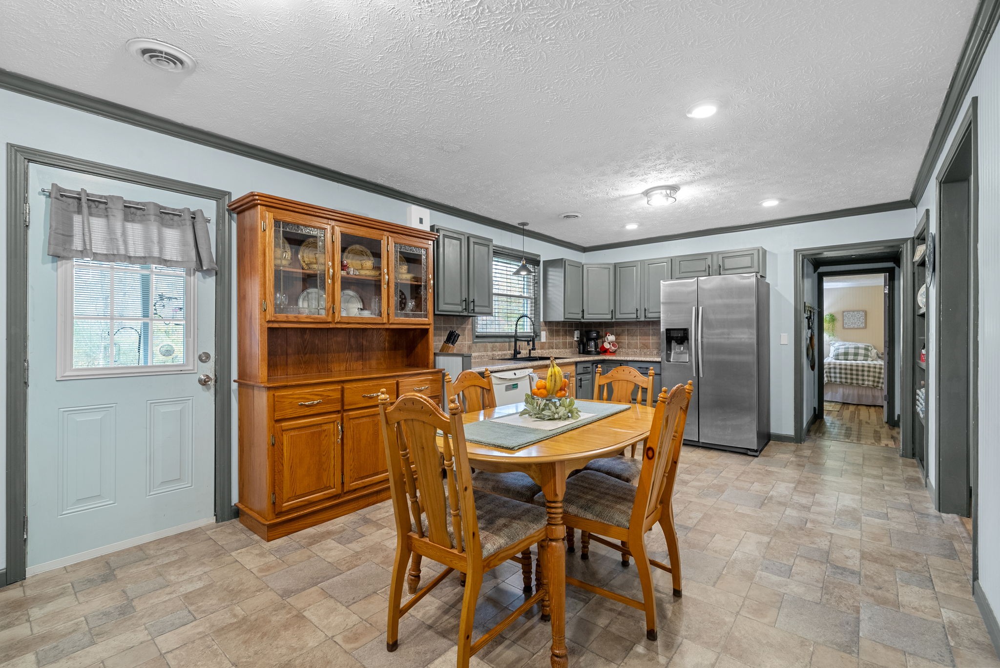 2126 Foster Road Cumberland Furnace, TN 37051 - Photo 17 of 42 a dining room with furniture and window