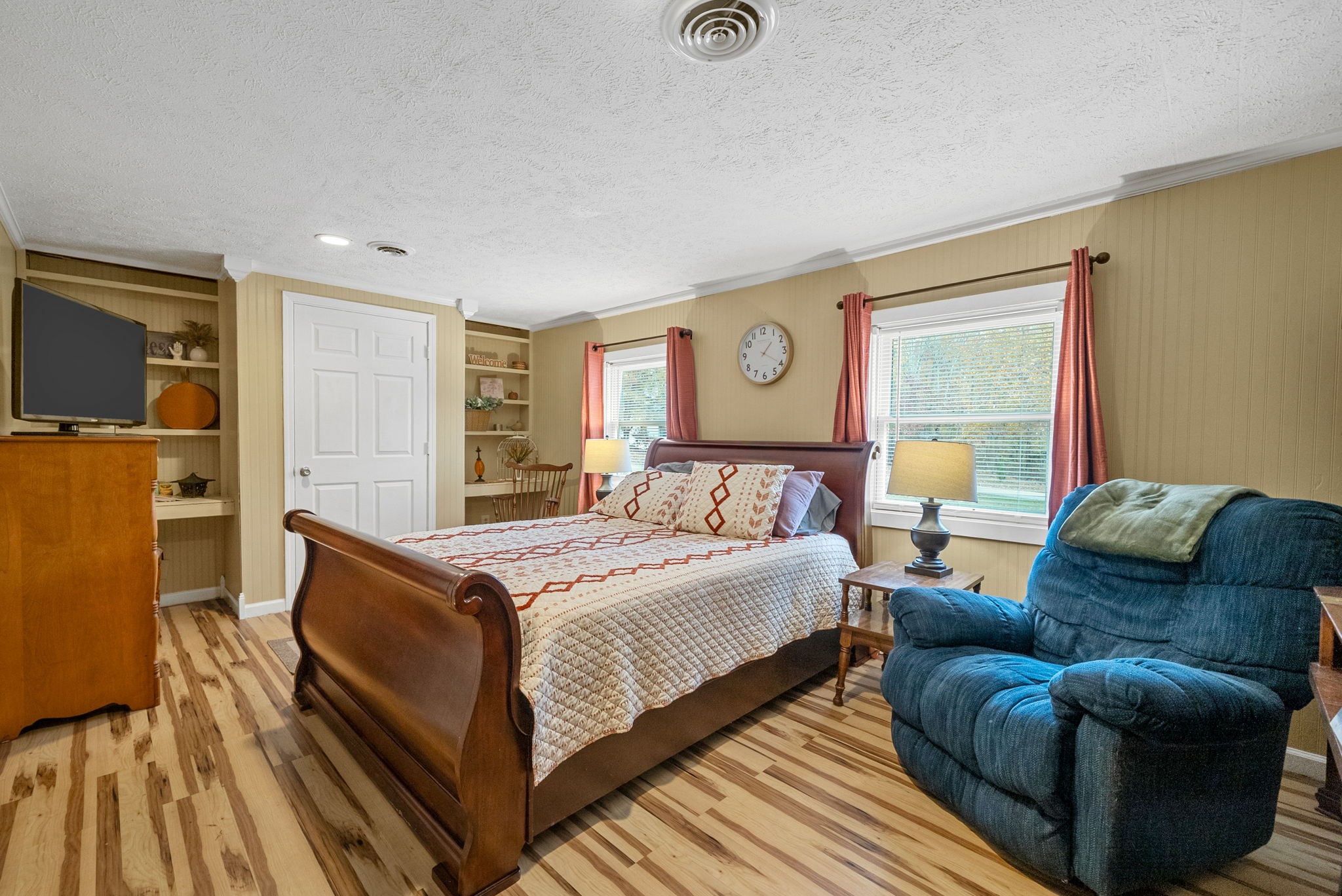 2126 Foster Road Cumberland Furnace, TN 37051 - Photo 26 of 42 a bedroom with a bed couch and a window