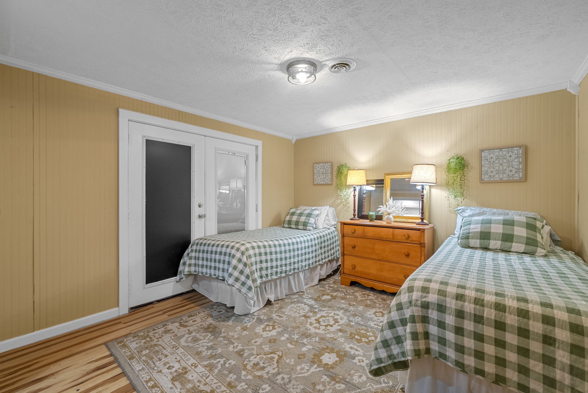 2126 Foster Road Cumberland Furnace, TN 37051 - Photo 28 of 42 a bedroom with a bed and wooden floor