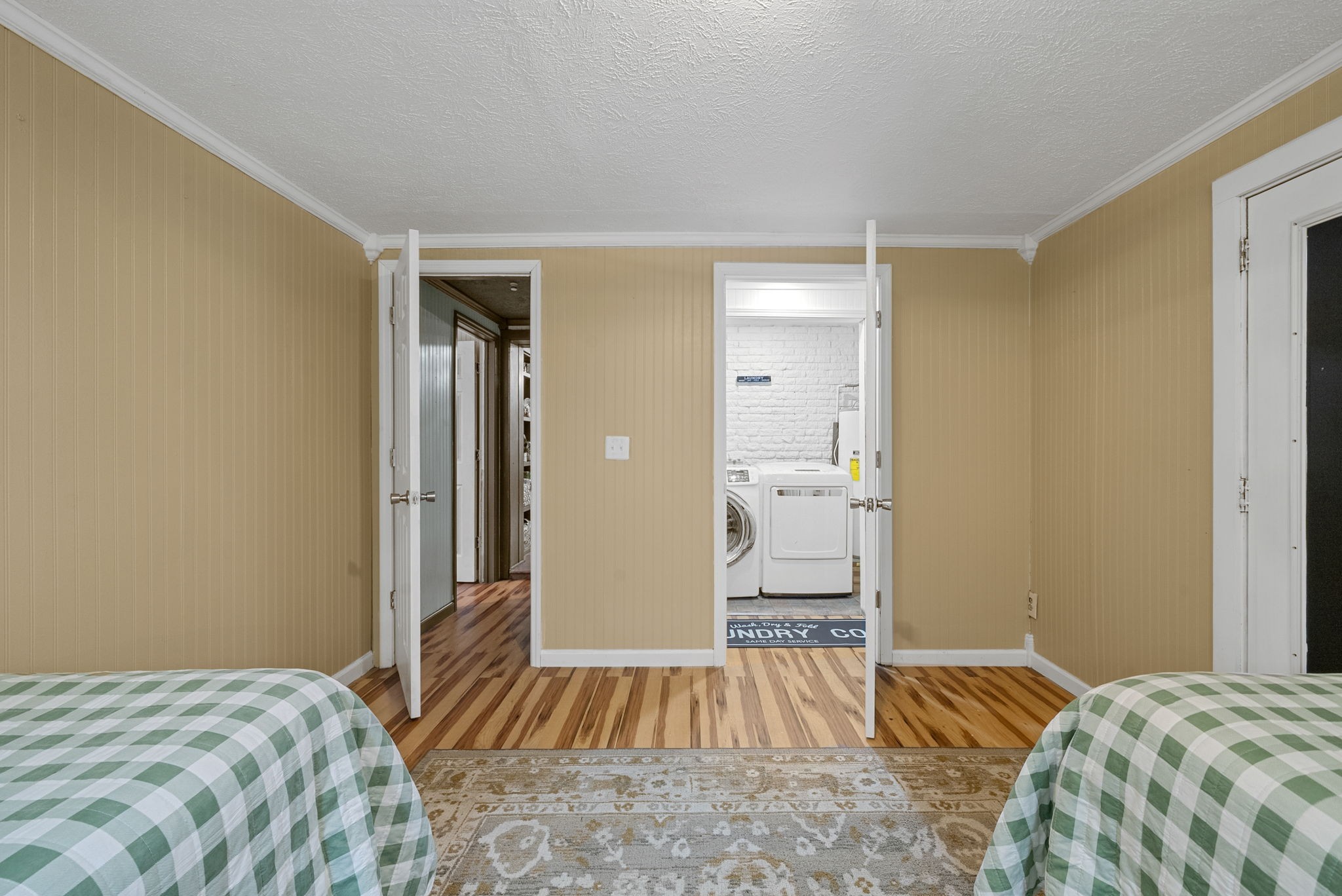 2126 Foster Road Cumberland Furnace, TN 37051 - Photo 29 of 42 a bedroom with a bed and wooden floor