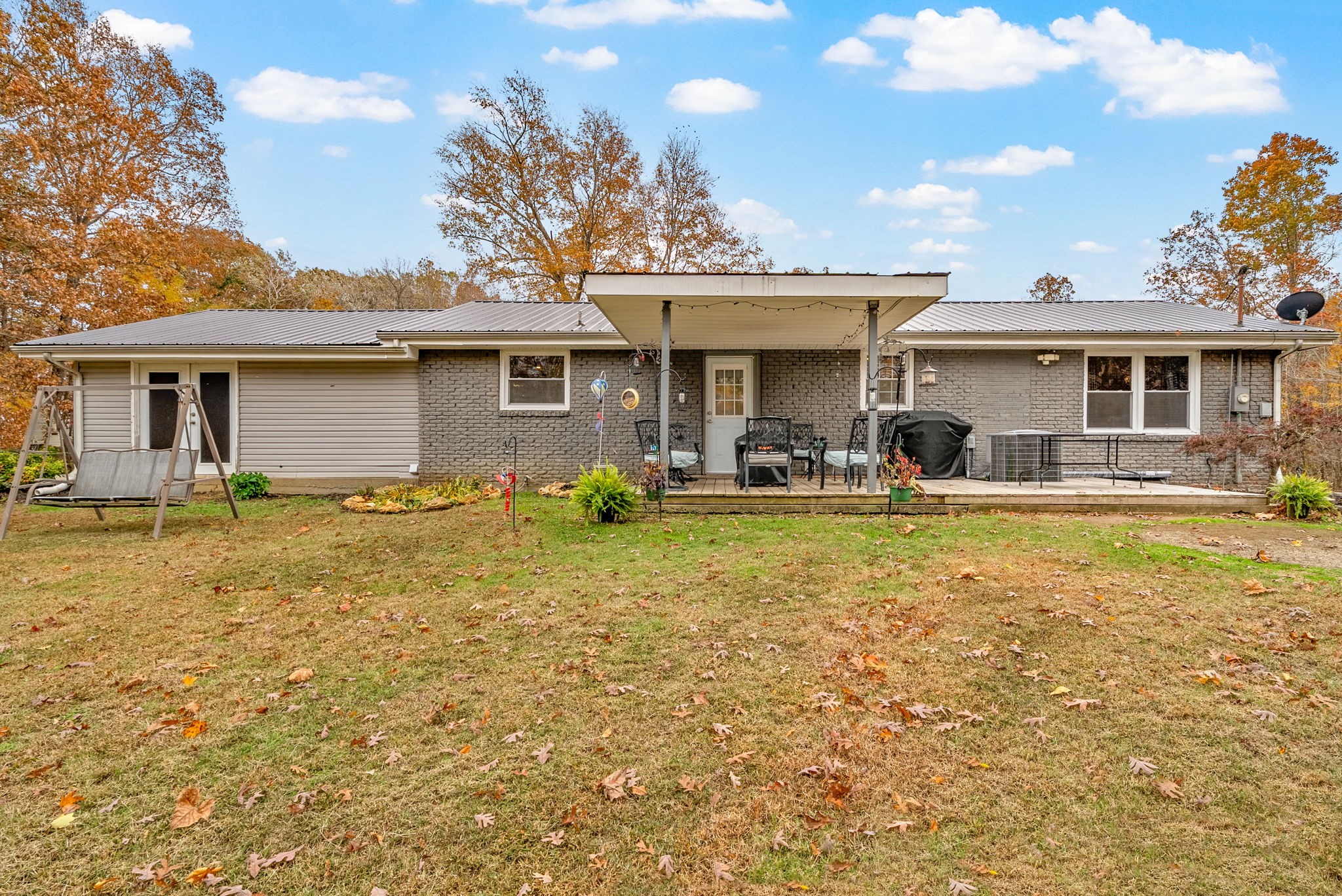 2126 Foster Road Cumberland Furnace, TN 37051 - Photo 34 of 42 a front view of a house with swimming pool and porch