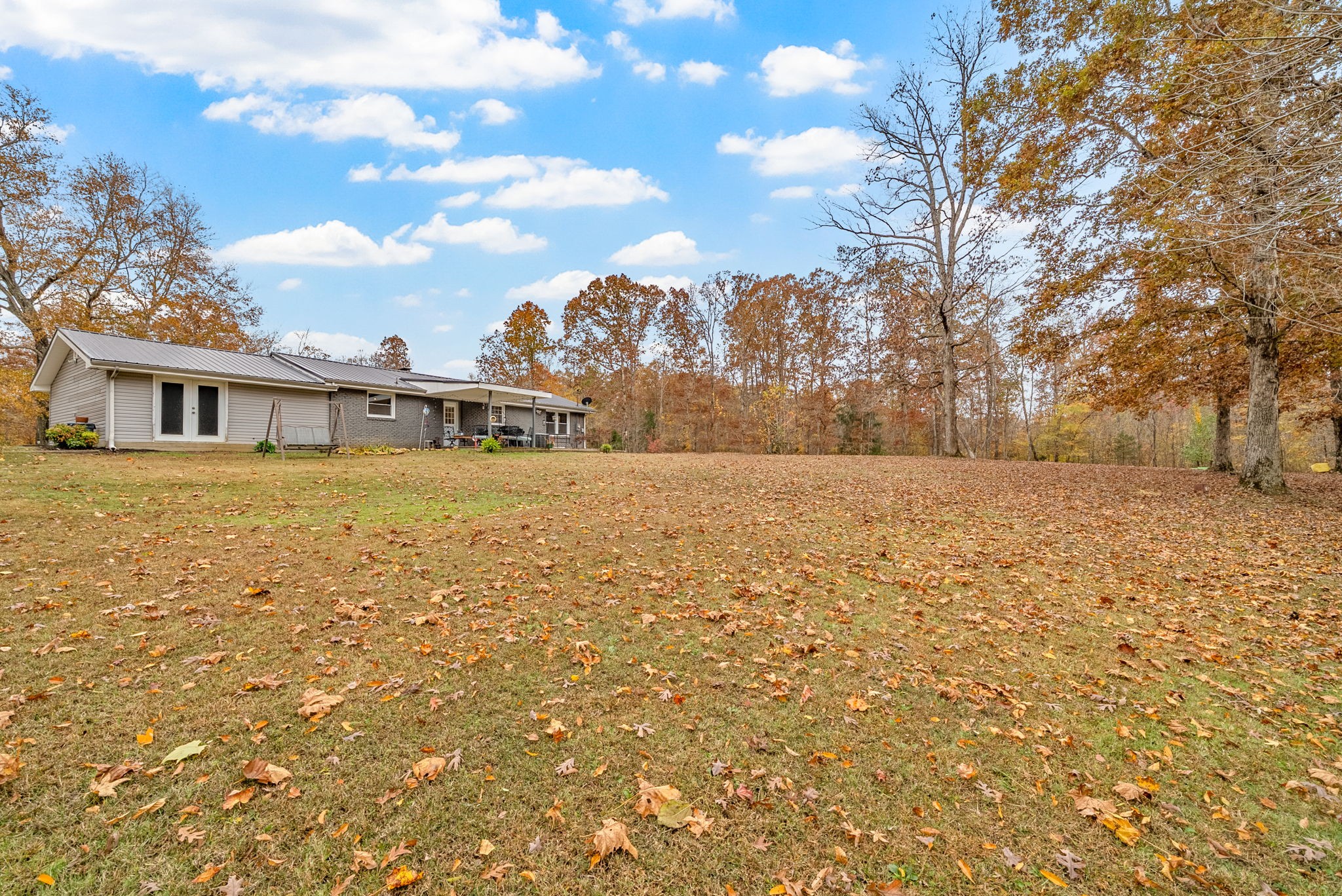 2126 Foster Road Cumberland Furnace, TN 37051 - Photo 35 of 42 a view of residential houses with yard and mountain view in back