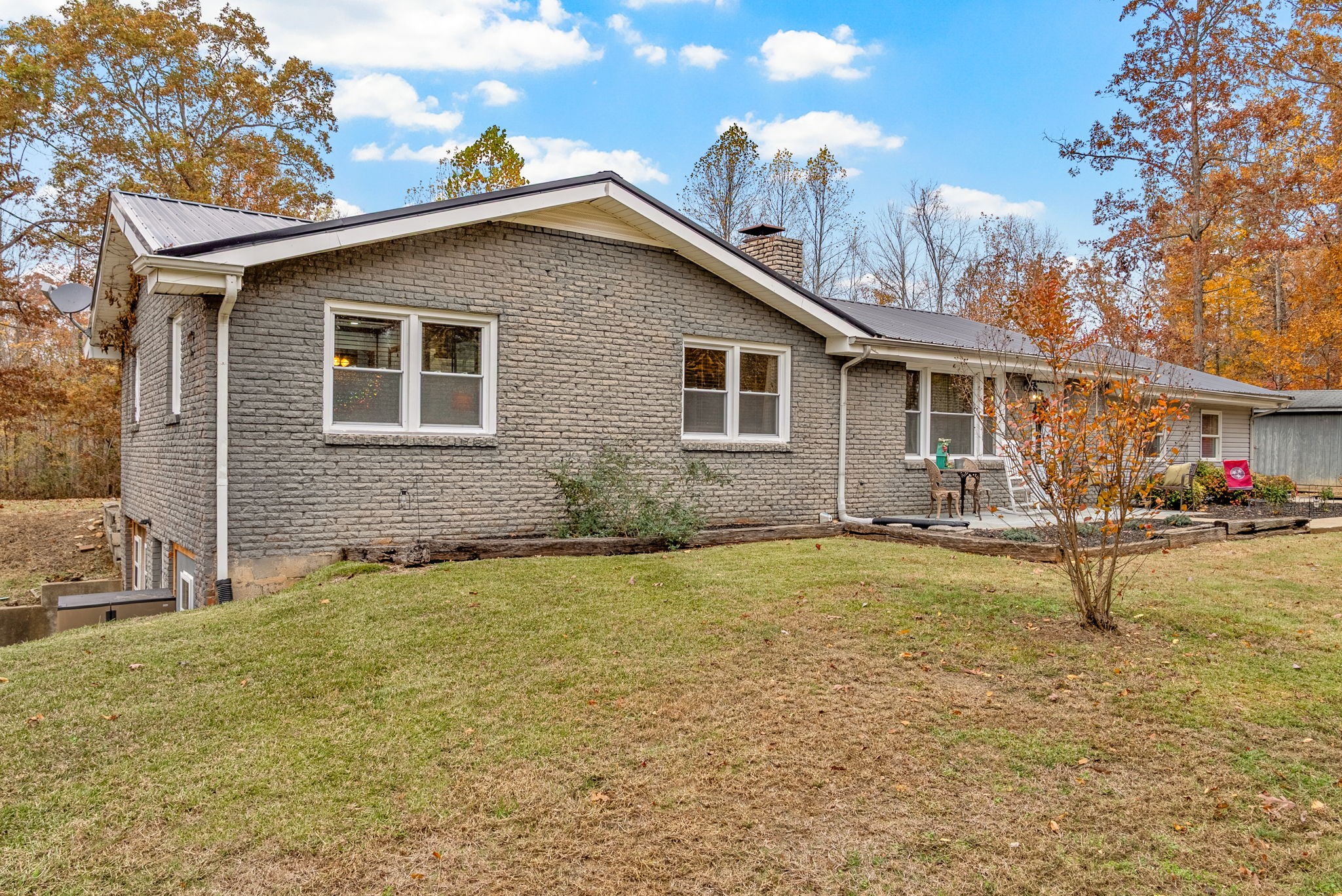 2126 Foster Road Cumberland Furnace, TN 37051 - Photo 5 of 42 a backyard of a house with table and chairs