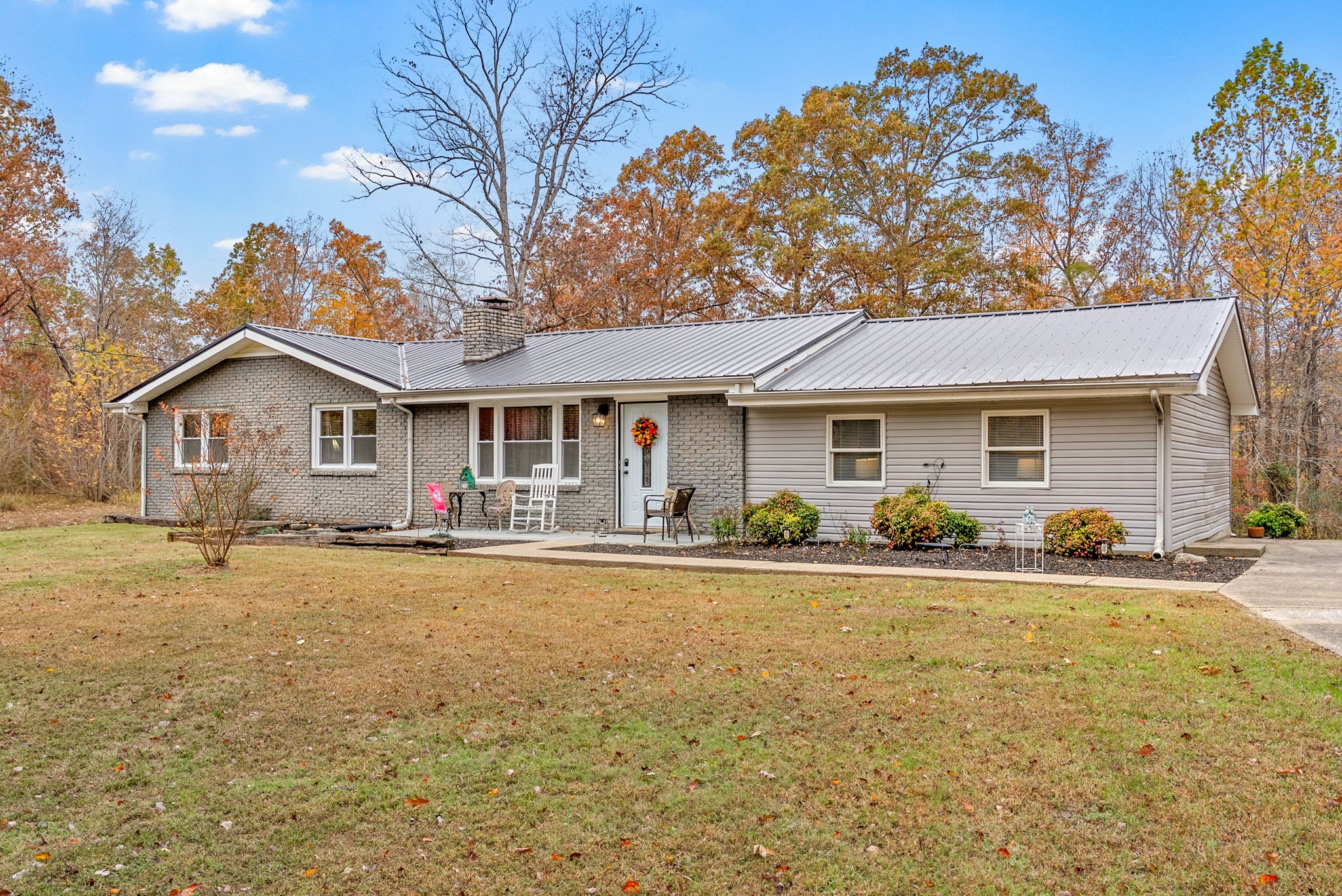 2126 Foster Road Cumberland Furnace, TN 37051 - Photo 6 of 42 a front view of a house with yard patio and swimming pool