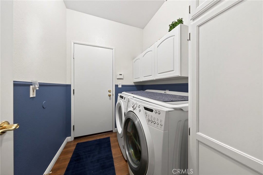 7619 Vista Rio Road Highland, CA 92346 - Photo 21 of 25 a utility room with dryer and washer