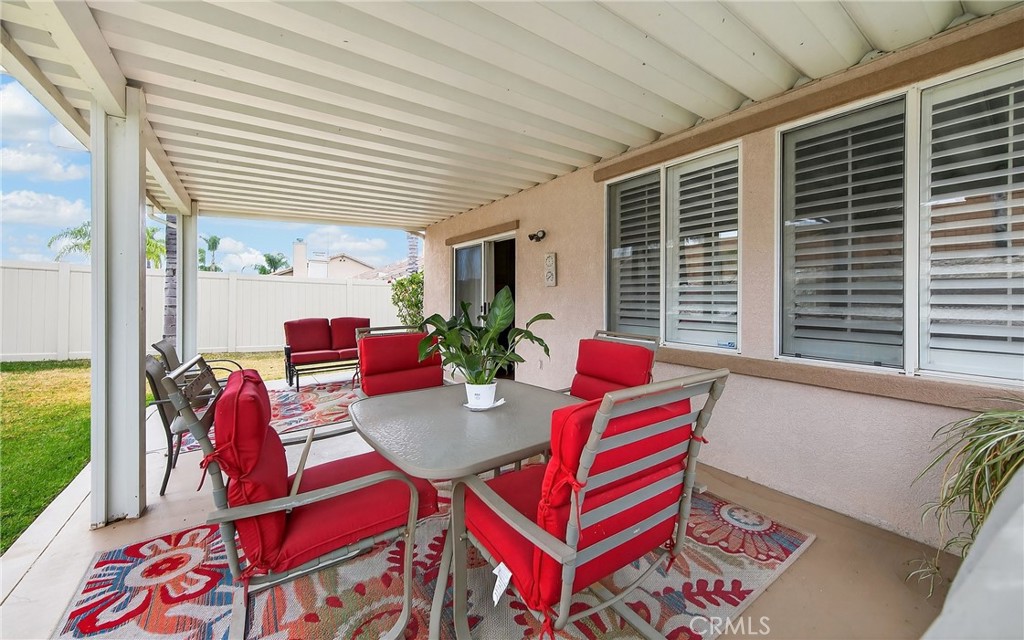 7619 Vista Rio Road Highland, CA 92346 - Photo 24 of 25 a living room filled with furniture and a potted plant