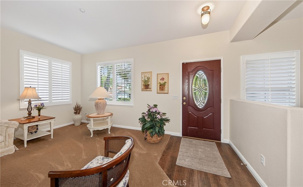 7619 Vista Rio Road Highland, CA 92346 - Photo 7 of 25 a living room with furniture and a window