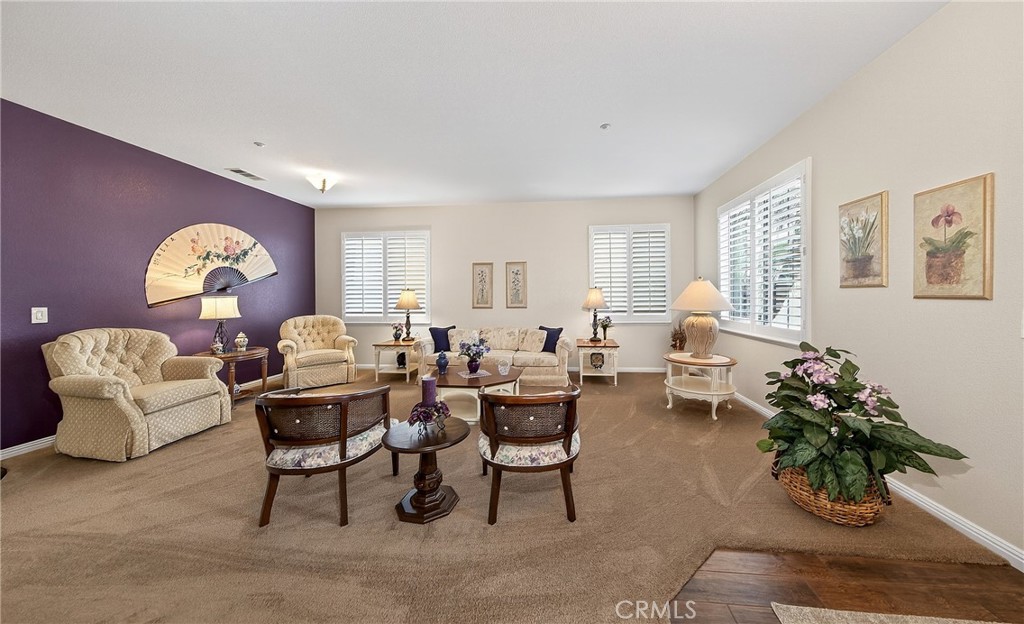 7619 Vista Rio Road Highland, CA 92346 - Photo 8 of 25 a living room with furniture potted plant and a window