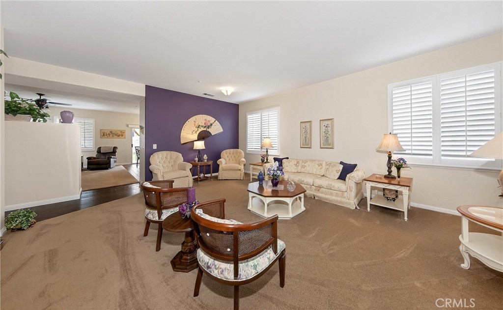 7619 Vista Rio Road Highland, CA 92346 - Photo 9 of 25 a living room with furniture two window and a table